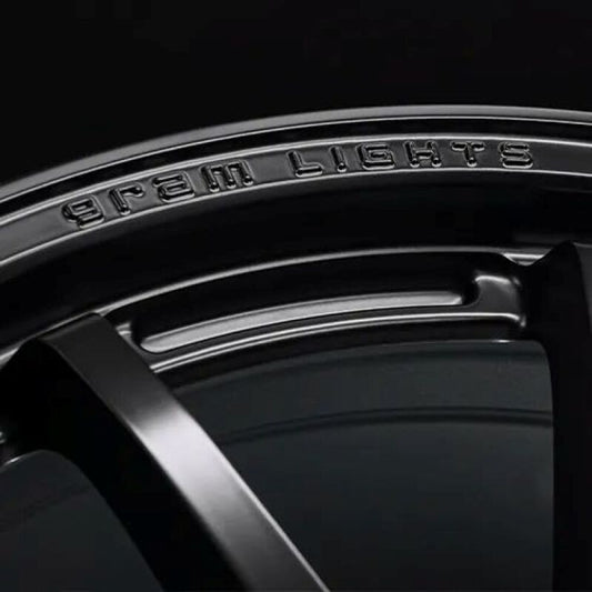 Gram Lights 57NR LIMITED II 18x9.5 +45 5-114.3 Semigloss Black Wheel w/ Black Cap/Stickers/Air Valve